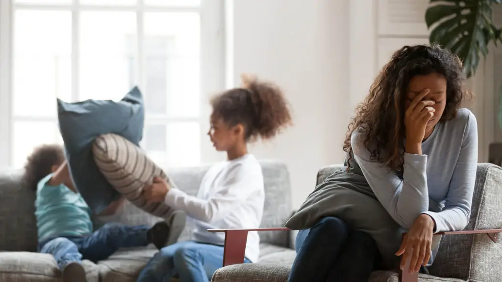 Tired and desperate Mother with children